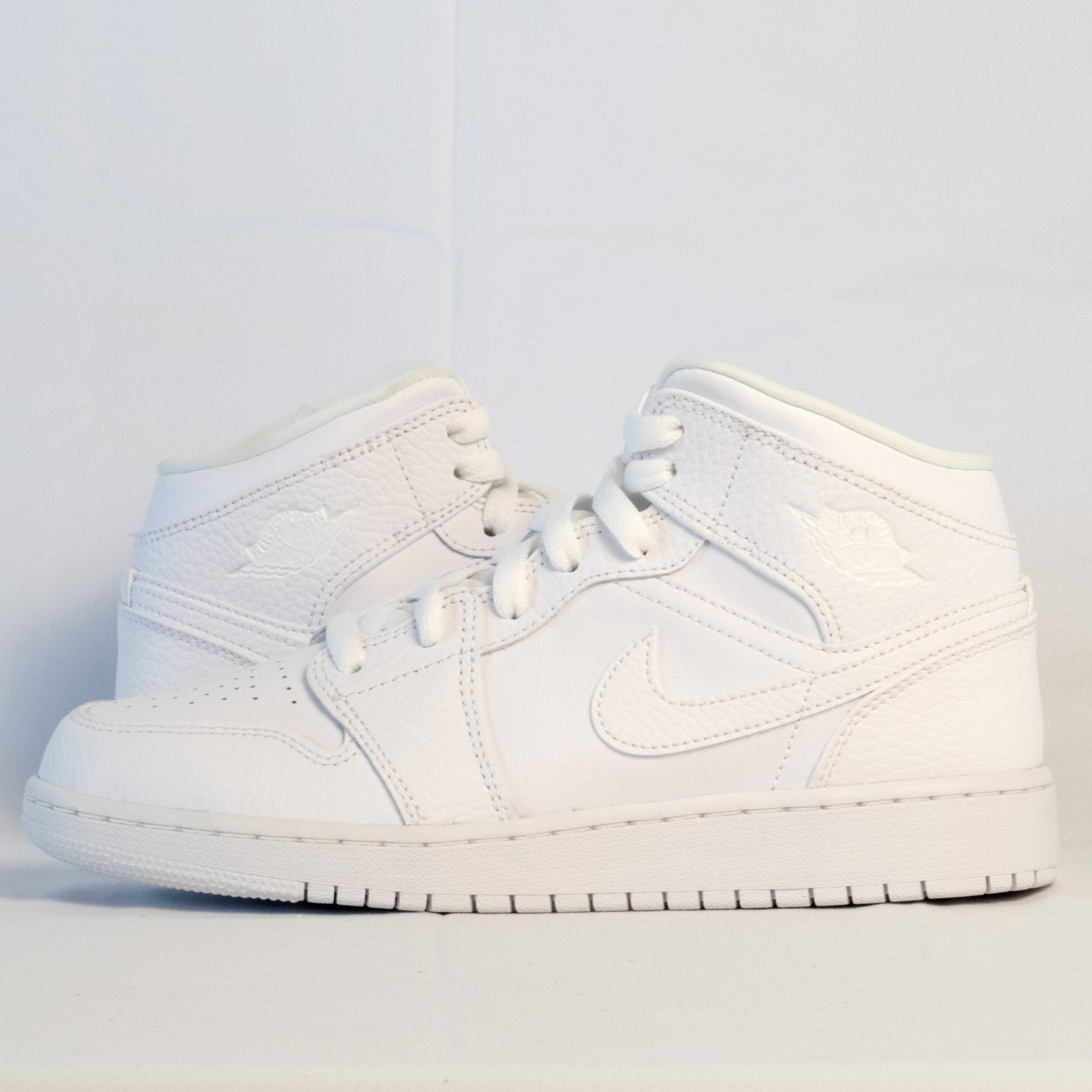 Jordan 1 Mid Triple White Tumbled Leather (GS) - 554725 - 130 - Men's and Women's Sneakers > Sneakers > Jordan 1 > Mid - Top Sneakers
